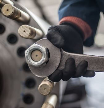 professional tightening a fastener